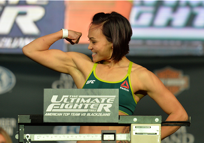 LAS VEGAS, NEVADA - JULY 11:   Michelle Waterson steps onto the scale during the TUF 21 Finale Weigh-in at the UFC Fan Expo in the Sands Expo and Convention Center on July 11, 2015 in Las Vegas Nevada. (Photo by Brandon Magnus/Zuffa LLC/Zuffa LLC via Gett