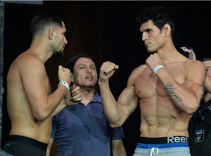 LAS VEGAS, NEVADA - JULY 11:   (L-R) Jorge Masvidal and Cezar Ferreira face off during the TUF 21 Finale Weigh-in at the UFC Fan Expo in the Sands Expo and Convention Center on July 11, 2015 in Las Vegas Nevada. (Photo by Brandon Magnus/Zuffa LLC/Zuffa LL