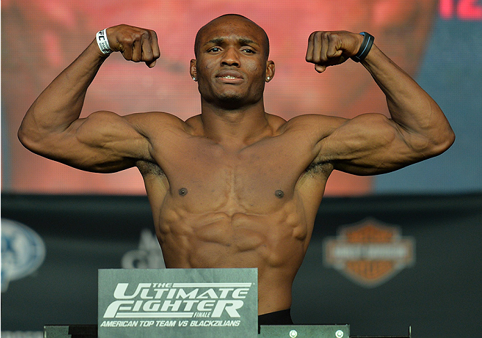 LAS VEGAS, NEVADA - JULY 11:   Kamaru Usman steps onto the scale during the TUF 21 Finale Weigh-in at the UFC Fan Expo in the Sands Expo and Convention Center on July 11, 2015 in Las Vegas Nevada. (Photo by Brandon Magnus/Zuffa LLC/Zuffa LLC via Getty Ima