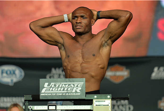 LAS VEGAS, NEVADA - JULY 11:   Kamaru Usman steps onto the scale during the TUF 21 Finale Weigh-in at the UFC Fan Expo in the Sands Expo and Convention Center on July 11, 2015 in Las Vegas Nevada. (Photo by Brandon Magnus/Zuffa LLC/Zuffa LLC via Getty Ima