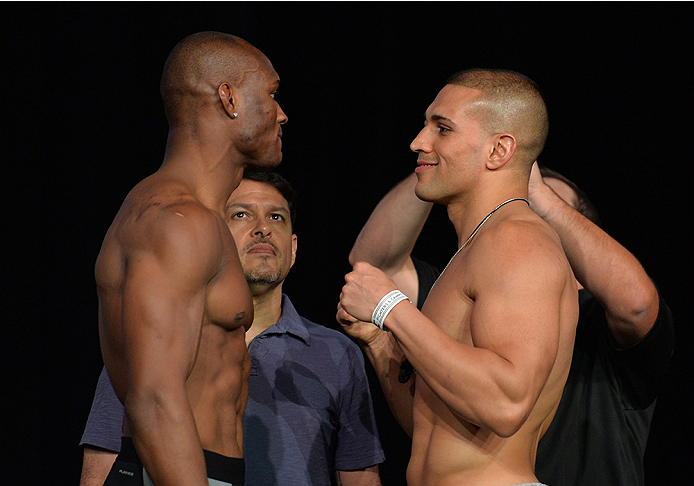 LAS VEGAS, NEVADA - JULY 11:   (L-R) Kamaru Usman and Hayden Hassan face off during the TUF 21 Finale Weigh-in at the UFC Fan Expo in the Sands Expo and Convention Center on July 11, 2015 in Las Vegas Nevada. (Photo by Brandon Magnus/Zuffa LLC/Zuffa LLC v