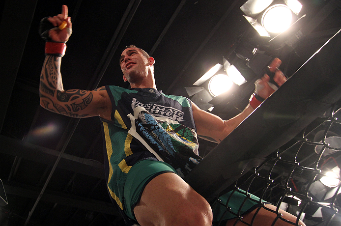 SAO PAULO, BRAZIL - FEBRUARY 11:  Santiago Ponzinibbio reacts after defeating Marcio "Pedra" Santos in their preliminary fight during filming of season two of The Ultimate Fighter Brazil on February 11, 2013 in Sao Paulo, Brazil. (Photo by Luiz Pires Dias