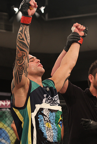 SAO PAULO, BRAZIL - FEBRUARY 11: Santiago Ponzinibbio reacts after defeating Marcio "Pedra" Santos in their preliminary fight during filming of season two of The Ultimate Fighter Brazil on February 11, 2013 in Sao Paulo, Brazil. (Photo by Luiz Pires Dias