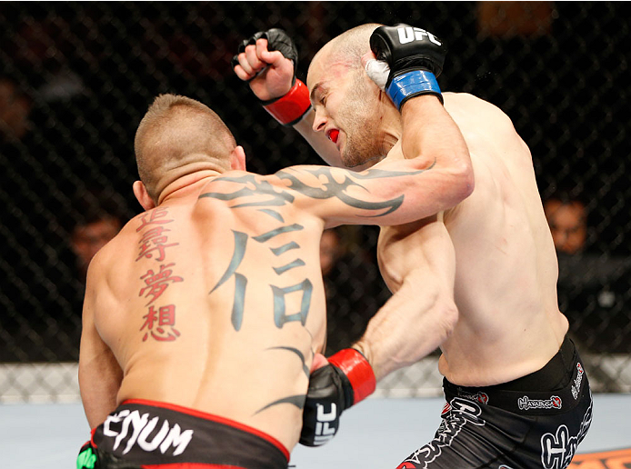 QUEBEC CITY, CANADA - APRIL 16: (L-R) Tim Gorman and Mitch Gagnon trade punches in their bantamweight fight during the TUF Nations Finale at Colisee Pepsi on April 16, 2014 in Quebec City, Quebec, Canada. (Photo by Josh Hedges/Zuffa LLC/Zuffa LLC via Get