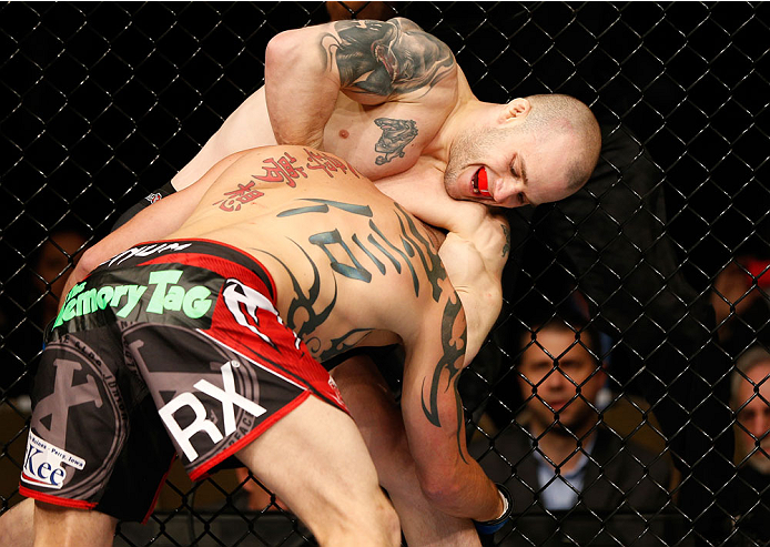 QUEBEC CITY, CANADA - APRIL 16:  (R-L) Mitch Gagnon attempts to secure a guillotine choke against Tim Gorman in their bantamweight fight during the TUF Nations Finale at Colisee Pepsi on April 16, 2014 in Quebec City, Quebec, Canada. (Photo by Josh Hedges