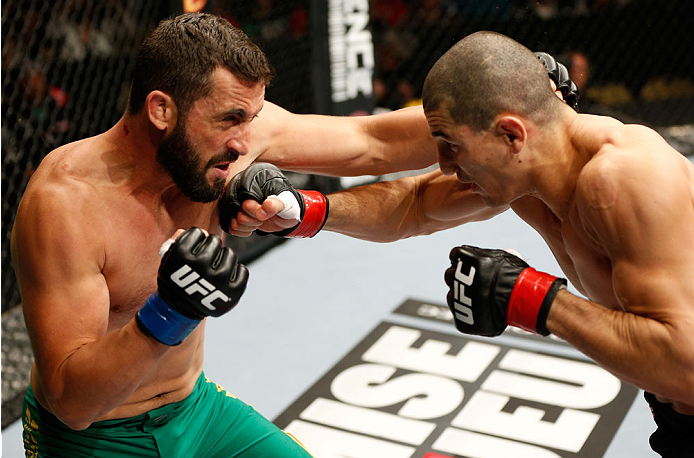 QUEBEC CITY, CANADA - APRIL 16:  (R-L) Nordine Taleb and Vik Grujic trade punches in their middleweight fight during the TUF Nations Finale at Colisee Pepsi on April 16, 2014 in Quebec City, Quebec, Canada. (Photo by Josh Hedges/Zuffa LLC/Zuffa LLC via Ge