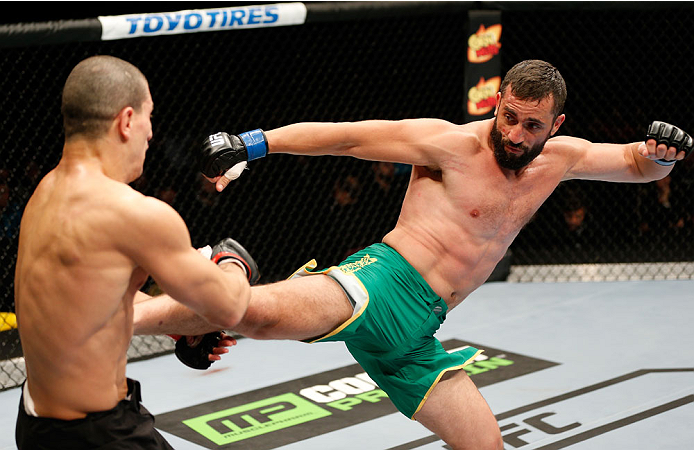 QUEBEC CITY, CANADA - APRIL 16:  (R-L) Vik Grujic kicks Nordine Taleb in their middleweight fight during the TUF Nations Finale at Colisee Pepsi on April 16, 2014 in Quebec City, Quebec, Canada. (Photo by Josh Hedges/Zuffa LLC/Zuffa LLC via Getty Images)