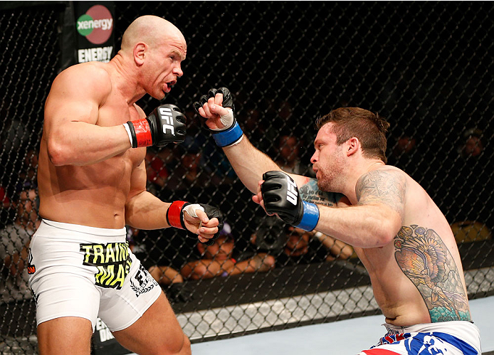 QUEBEC CITY, CANADA - APRIL 16:  Sean O'Connell (R) falls to the canvas after a right hand by Ryan Jimmo in their light heavyweight fight during the TUF Nations Finale at Colisee Pepsi on April 16, 2014 in Quebec City, Quebec, Canada. (Photo by Josh Hedge