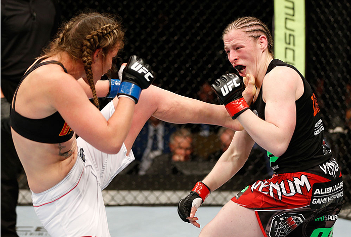 QUEBEC CITY, CANADA - APRIL 16:  (L-R) Leslie Smith kicks Sarah Kaufman in their women's bantamweight fight during the TUF Nations Finale at Colisee Pepsi on April 16, 2014 in Quebec City, Quebec, Canada. (Photo by Josh Hedges/Zuffa LLC/Zuffa LLC via Gett