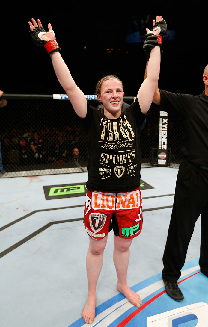 QUEBEC CITY, CANADA - APRIL 16:  Sarah Kaufman reacts after her victory over Leslie Smith in their women's bantamweight fight during the TUF Nations Finale at Colisee Pepsi on April 16, 2014 in Quebec City, Quebec, Canada. (Photo by Josh Hedges/Zuffa LLC/