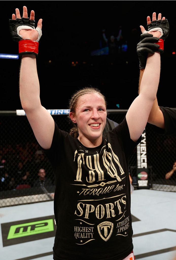 QUEBEC CITY, CANADA - APRIL 16:  Sarah Kaufman reacts after her victory over Leslie Smith in their women's bantamweight fight during the TUF Nations Finale at Colisee Pepsi on April 16, 2014 in Quebec City, Quebec, Canada. (Photo by Josh Hedges/Zuffa LLC/