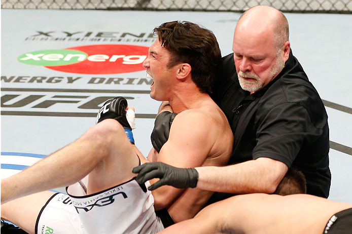 QUEBEC CITY, CANADA - APRIL 16: KJ Noons (L) reacts after his knockout victory over Sam Stout in their welterweight fight during the TUF Nations Finale at Colisee Pepsi on April 16, 2014 in Quebec City, Quebec, Canada. (Photo by Josh Hedges/Zuffa LLC/Zuf