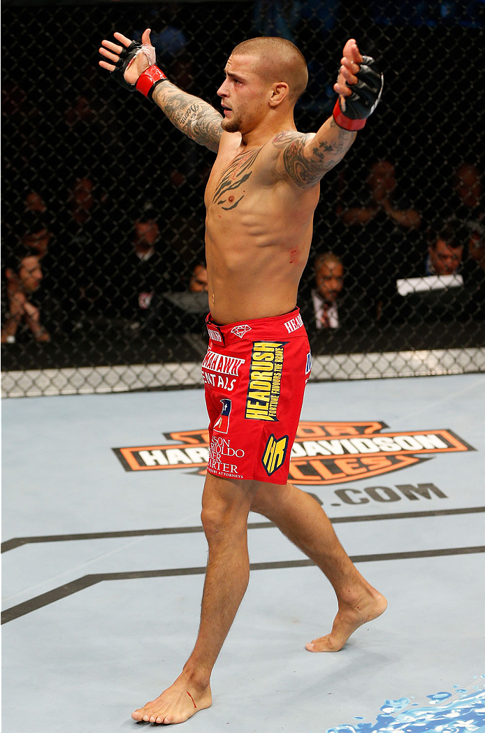 QUEBEC CITY, CANADA - APRIL 16:  Dustin Poirier reacts after his TKO victory over Akira Corassani in their featherweight fight during the TUF Nations Finale at Colisee Pepsi on April 16, 2014 in Quebec City, Quebec, Canada. (Photo by Josh Hedges/Zuffa LLC