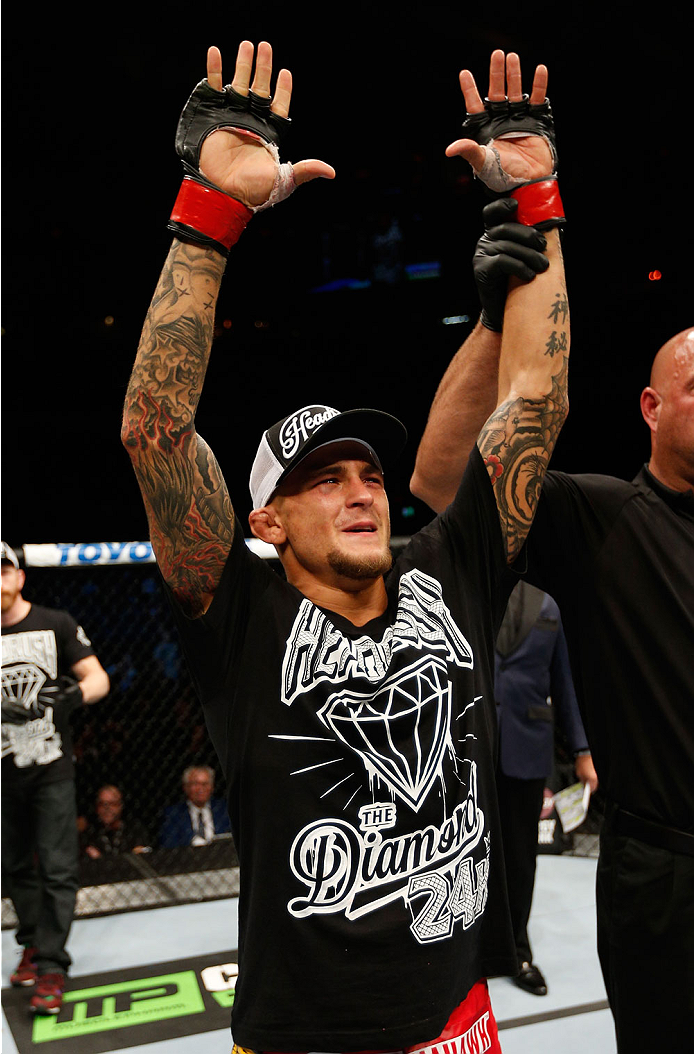 QUEBEC CITY, CANADA - APRIL 16:  Dustin Poirier reacts after his TKO victory over Akira Corassani in their featherweight fight during the TUF Nations Finale at Colisee Pepsi on April 16, 2014 in Quebec City, Quebec, Canada. (Photo by Josh Hedges/Zuffa LLC