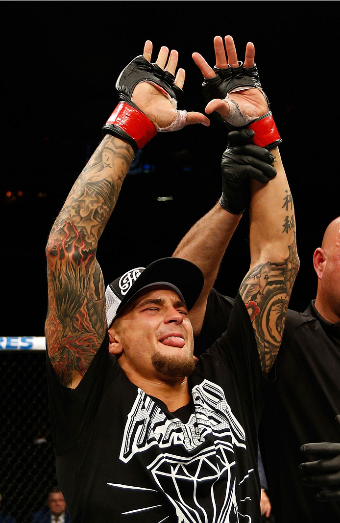 QUEBEC CITY, CANADA - APRIL 16:  Dustin Poirier reacts after his TKO victory over Akira Corassani in their featherweight fight during the TUF Nations Finale at Colisee Pepsi on April 16, 2014 in Quebec City, Quebec, Canada. (Photo by Josh Hedges/Zuffa LLC