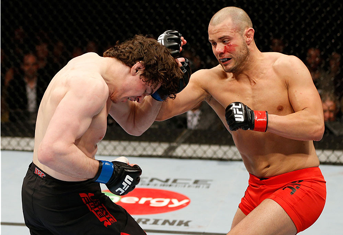 QUEBEC CITY, CANADA - APRIL 16:  (R-L) Chad Laprise punches Olivier Aubin-Mercier in their welterweight fight during the TUF Nations Finale at Colisee Pepsi on April 16, 2014 in Quebec City, Quebec, Canada. (Photo by Josh Hedges/Zuffa LLC/Zuffa LLC via Ge