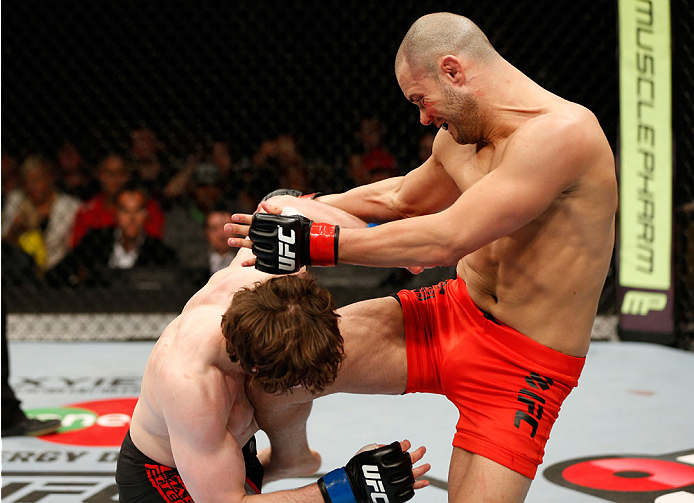 QUEBEC CITY, CANADA - APRIL 16:  (R-L) Chad Laprise knees Olivier Aubin-Mercier in their welterweight fight during the TUF Nations Finale at Colisee Pepsi on April 16, 2014 in Quebec City, Quebec, Canada. (Photo by Josh Hedges/Zuffa LLC/Zuffa LLC via Gett