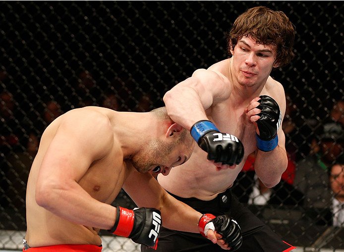 QUEBEC CITY, CANADA - APRIL 16:  (R-L) Olivier Aubin-Mercier punches Chad Laprise in their welterweight fight during the TUF Nations Finale at Colisee Pepsi on April 16, 2014 in Quebec City, Quebec, Canada. (Photo by Josh Hedges/Zuffa LLC/Zuffa LLC via Ge