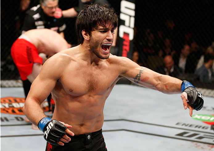 QUEBEC CITY, CANADA - APRIL 16:  Elias Theodorou reacts after his TKO victory over Sheldon Wescott in their middleweight fight during the TUF Nations Finale at Colisee Pepsi on April 16, 2014 in Quebec City, Quebec, Canada. (Photo by Josh Hedges/Zuffa LLC