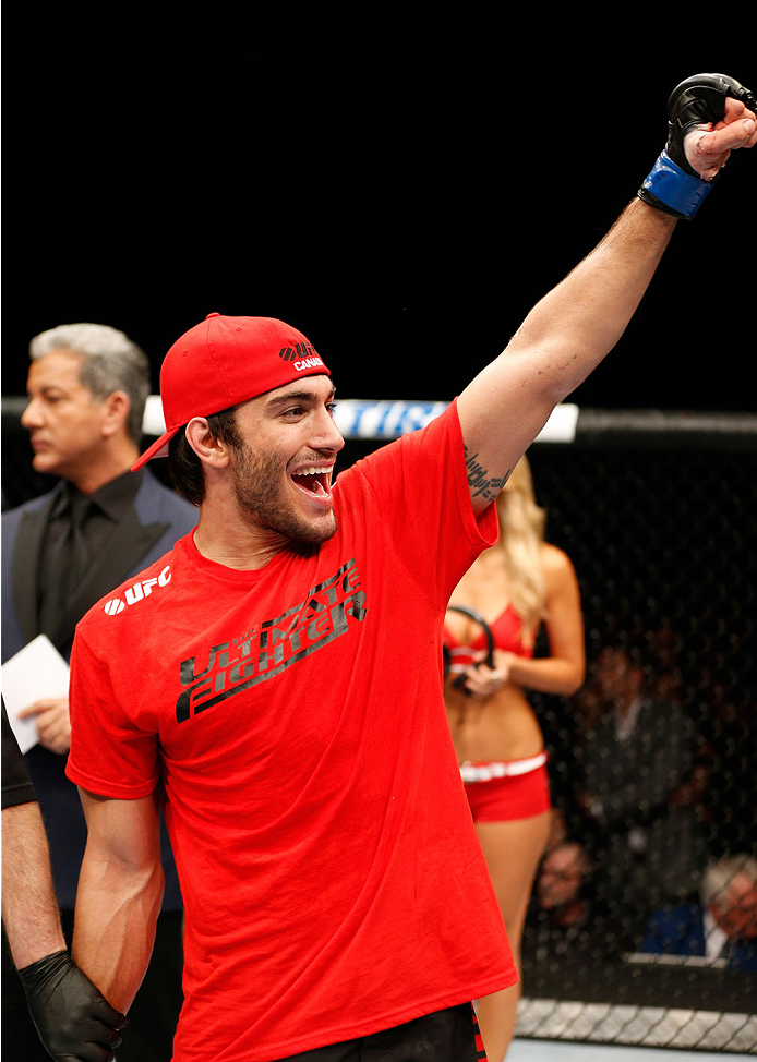 QUEBEC CITY, CANADA - APRIL 16:  Elias Theodorou reacts after his TKO victory over Sheldon Wescott in their middleweight fight during the TUF Nations Finale at Colisee Pepsi on April 16, 2014 in Quebec City, Quebec, Canada. (Photo by Josh Hedges/Zuffa LLC