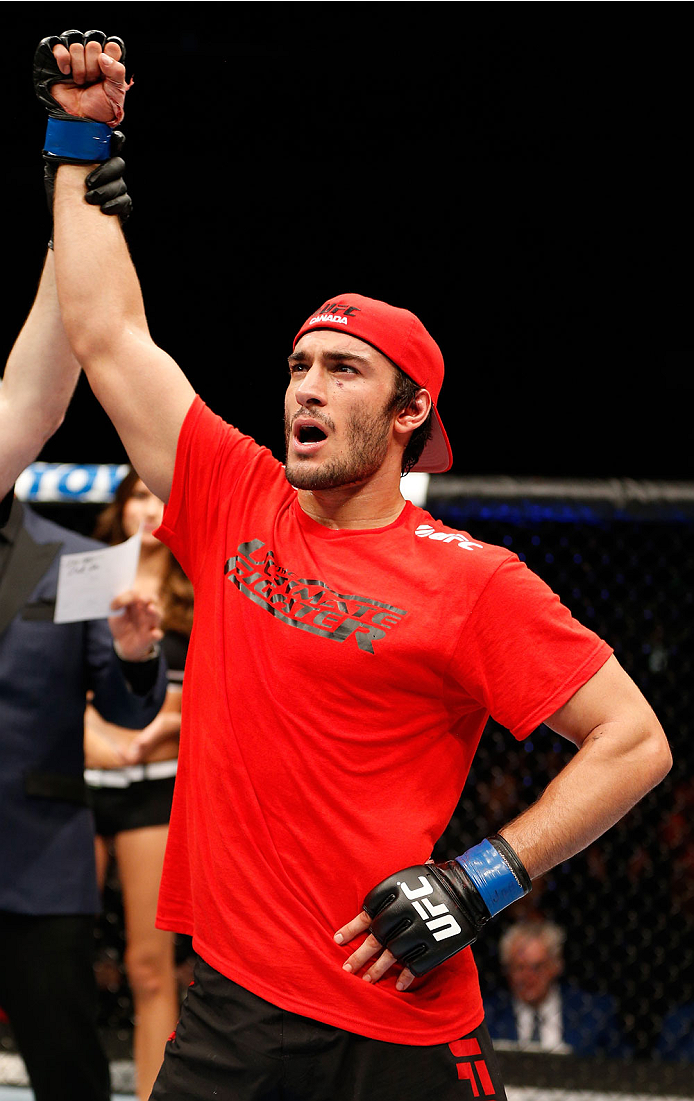 QUEBEC CITY, CANADA - APRIL 16:  Elias Theodorou reacts after his TKO victory over Sheldon Wescott in their middleweight fight during the TUF Nations Finale at Colisee Pepsi on April 16, 2014 in Quebec City, Quebec, Canada. (Photo by Josh Hedges/Zuffa LLC