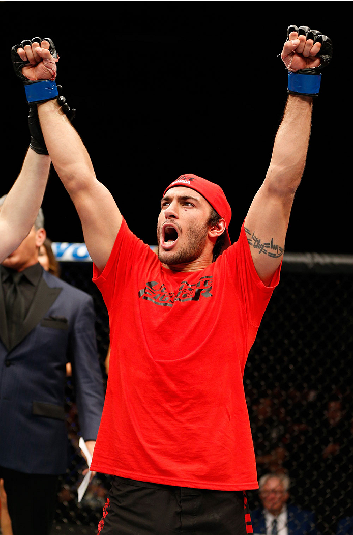 QUEBEC CITY, CANADA - APRIL 16:  Elias Theodorou reacts after his TKO victory over Sheldon Wescott in their middleweight fight during the TUF Nations Finale at Colisee Pepsi on April 16, 2014 in Quebec City, Quebec, Canada. (Photo by Josh Hedges/Zuffa LLC