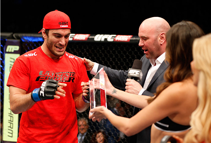 QUEBEC CITY, CANADA - APRIL 16:  Elias Theodorou reacts after his TKO victory over Sheldon Wescott in their middleweight fight during the TUF Nations Finale at Colisee Pepsi on April 16, 2014 in Quebec City, Quebec, Canada. (Photo by Josh Hedges/Zuffa LLC