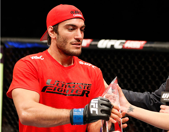 QUEBEC CITY, CANADA - APRIL 16:  Elias Theodorou reacts after his TKO victory over Sheldon Wescott in their middleweight fight during the TUF Nations Finale at Colisee Pepsi on April 16, 2014 in Quebec City, Quebec, Canada. (Photo by Josh Hedges/Zuffa LLC