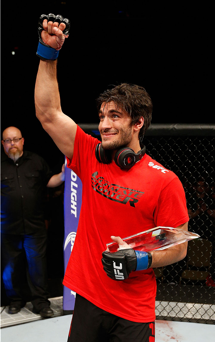 QUEBEC CITY, CANADA - APRIL 16:  Elias Theodorou reacts after his TKO victory over Sheldon Wescott in their middleweight fight during the TUF Nations Finale at Colisee Pepsi on April 16, 2014 in Quebec City, Quebec, Canada. (Photo by Josh Hedges/Zuffa LLC