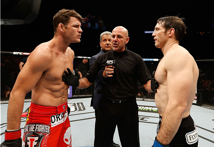 QUEBEC CITY, CANADA - APRIL 16:  (L-R) Opponents Michael Bisping and Tim Kennedy face off before their middleweight fight during the TUF Nations Finale at Colisee Pepsi on April 16, 2014 in Quebec City, Quebec, Canada. (Photo by Josh Hedges/Zuffa LLC/Zuff