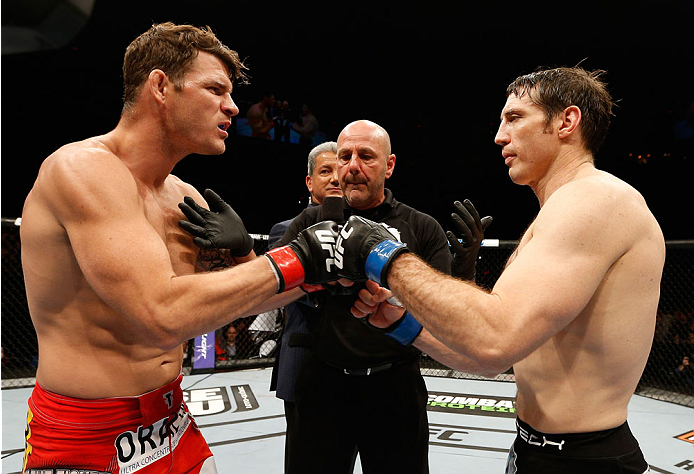 QUEBEC CITY, CANADA - APRIL 16:  (L-R) Opponents Michael Bisping and Tim Kennedy face off before their middleweight fight during the TUF Nations Finale at Colisee Pepsi on April 16, 2014 in Quebec City, Quebec, Canada. (Photo by Josh Hedges/Zuffa LLC/Zuff