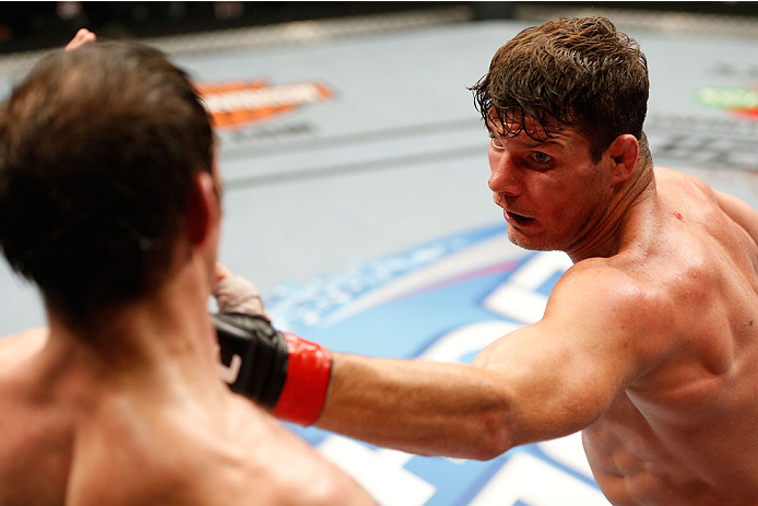 QUEBEC CITY, CANADA - APRIL 16:  (R-L) Michael Bisping battles Tim Kennedy in their middleweight fight during the TUF Nations Finale at Colisee Pepsi on April 16, 2014 in Quebec City, Quebec, Canada. (Photo by Josh Hedges/Zuffa LLC/Zuffa LLC via Getty Ima