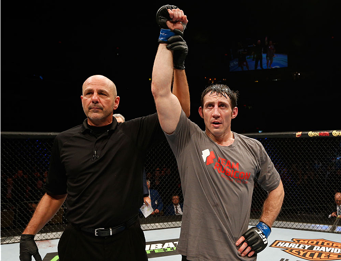 QUEBEC CITY, CANADA - APRIL 16:  Tim Kennedy reacts after his decision victory over Michael Bisping in their middleweight fight during the TUF Nations Finale at Colisee Pepsi on April 16, 2014 in Quebec City, Quebec, Canada. (Photo by Josh Hedges/Zuffa LL