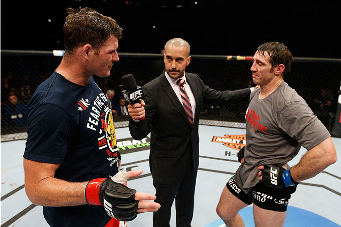 QUEBEC CITY, CANADA - APRIL 16:  Michael Bisping (L) congratulates Tim Kennedy on his decision victory after their middleweight fight during the TUF Nations Finale at Colisee Pepsi on April 16, 2014 in Quebec City, Quebec, Canada. (Photo by Josh Hedges/Zu