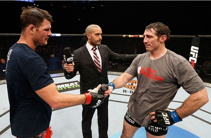 QUEBEC CITY, CANADA - APRIL 16:  Michael Bisping (L) congratulates Tim Kennedy on his decision victory after their middleweight fight during the TUF Nations Finale at Colisee Pepsi on April 16, 2014 in Quebec City, Quebec, Canada. (Photo by Josh Hedges/Zu