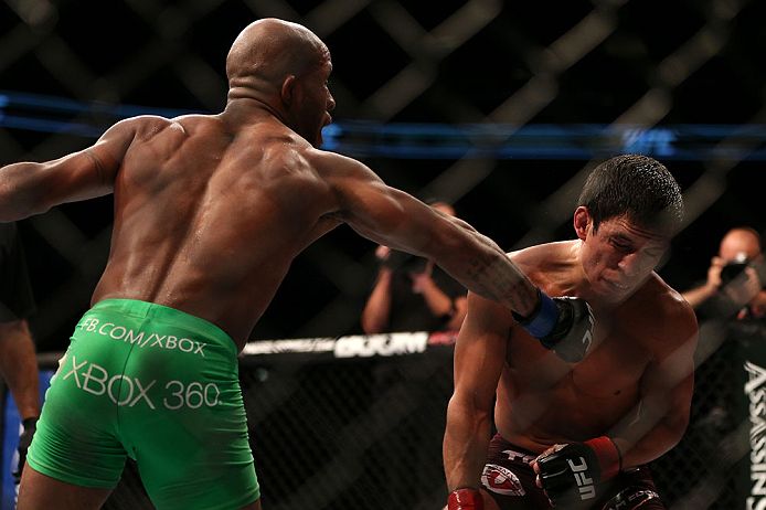 TORONTO, CANADA - SEPTEMBER 22: (L-R) Demetrious Johnson punches Joseph Benavidez during their flyweight championship bout at UFC 152 inside Air Canada Centre on September 22, 2012 in Toronto, Ontario, Canada. (Photo by Josh Hedges/Zuffa LLC/Zuffa LLC
