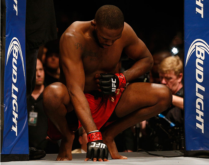 BALTIMORE, MD - APRIL 26: Jon "Bones" Jones enters the Octagon before his light heavyweight championship bout against Glover Teixeira during the UFC 172 event at the Baltimore Arena on April 26, 2014 in Baltimore, Maryland. (Photo by Josh Hedges/Zuffa LL