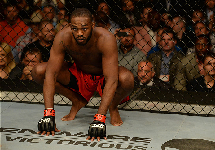 BALTIMORE, MD - APRIL 26: Jon "Bones" Jones crouches in the Octagon before his light heavyweight championship bout against Glover Teixeira during the UFC 172 event at the Baltimore Arena on April 26, 2014 in Baltimore, Maryland. (Photo by Patrick Smith/Zu