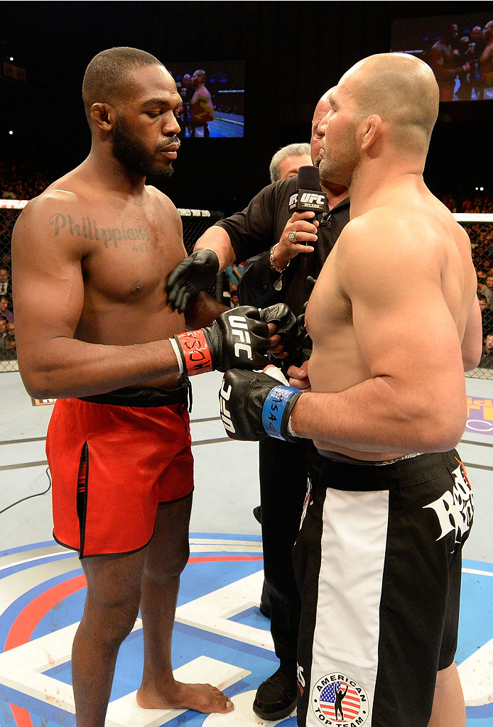 BALTIMORE, MD - APRIL 26:  (L-R) Opponents Jon "Bones" Jones and Glover Teixeira face off before their light heavyweight championship bout during the UFC 172 event at the Baltimore Arena on April 26, 2014 in Baltimore, Maryland. (Photo by Josh Hedges/Zuff