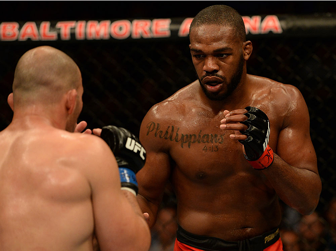 BALTIMORE, MD - APRIL 26:  (R-L) Jon "Bones" Jones squares off with opponent Glover Teixeira in their light heavyweight championship bout during the UFC 172 event at the Baltimore Arena on April 26, 2014 in Baltimore, Maryland. (Photo by Patrick Smith/Zuf