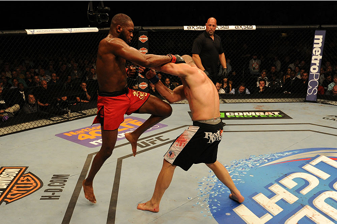 BALTIMORE, MD - APRIL 26: (L-R) Jon "Bones" Jones knees Glover Teixeira in their light heavyweight championship bout during the UFC 172 event at the Baltimore Arena on April 26, 2014 in Baltimore, Maryland. (Photo by Patrick Smith/Zuffa LLC/Zuffa LLC via