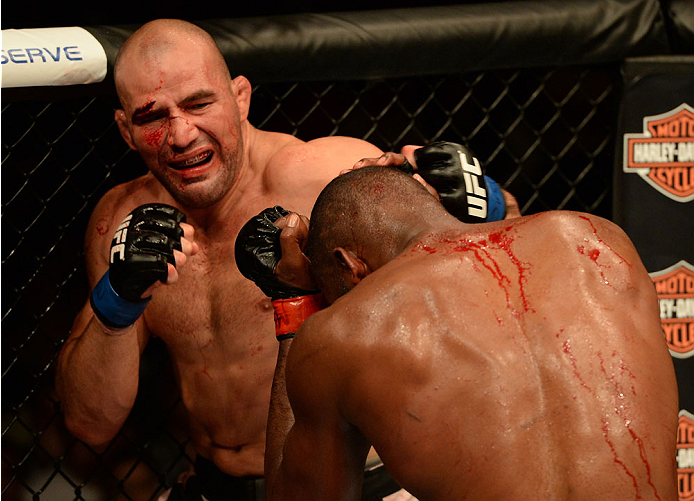 BALTIMORE, MD - APRIL 26:  (L-R) Glover Teixeira punches Jon "Bones" Jones in their light heavyweight championship bout during the UFC 172 event at the Baltimore Arena on April 26, 2014 in Baltimore, Maryland. (Photo by Patrick Smith/Zuffa LLC/Zuffa LLC v