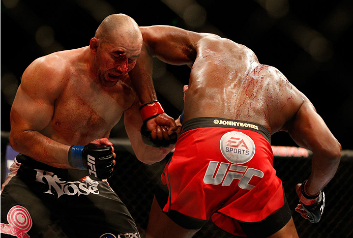 BALTIMORE, MD - APRIL 26:  (R-L) Jon "Bones" Jones elbows Glover Teixeira in their light heavyweight championship bout during the UFC 172 event at the Baltimore Arena on April 26, 2014 in Baltimore, Maryland. (Photo by Josh Hedges/Zuffa LLC/Zuffa LLC via 