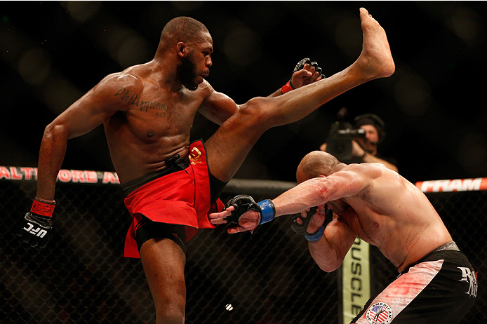 BALTIMORE, MD - APRIL 26:  (L-R) Jon "Bones" Jones kicks Glover Teixeira in their light heavyweight championship bout during the UFC 172 event at the Baltimore Arena on April 26, 2014 in Baltimore, Maryland. (Photo by Josh Hedges/Zuffa LLC/Zuffa LLC via G