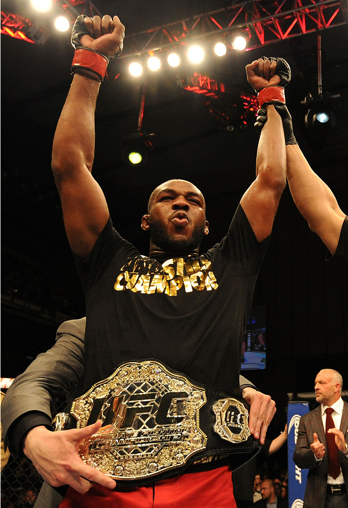 BALTIMORE, MD - APRIL 26:  Jon "Bones" Jones reacts after defeating Glover Teixeira in their light heavyweight championship bout during the UFC 172 event at the Baltimore Arena on April 26, 2014 in Baltimore, Maryland. (Photo by Patrick Smith/Zuffa LLC/Zu