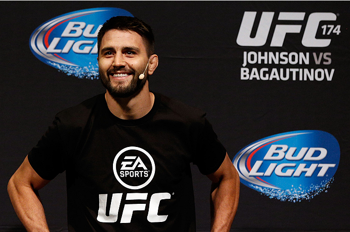 VANCOUVER, BC - JUNE 13:  Carlos Condit interacts with fans during a Q&A session before the UFC 174 weigh-in at Rogers Arena on June 13, 2014 in Vancouver, Canada.  (Photo by Josh Hedges/Zuffa LLC/Zuffa LLC via Getty Images)