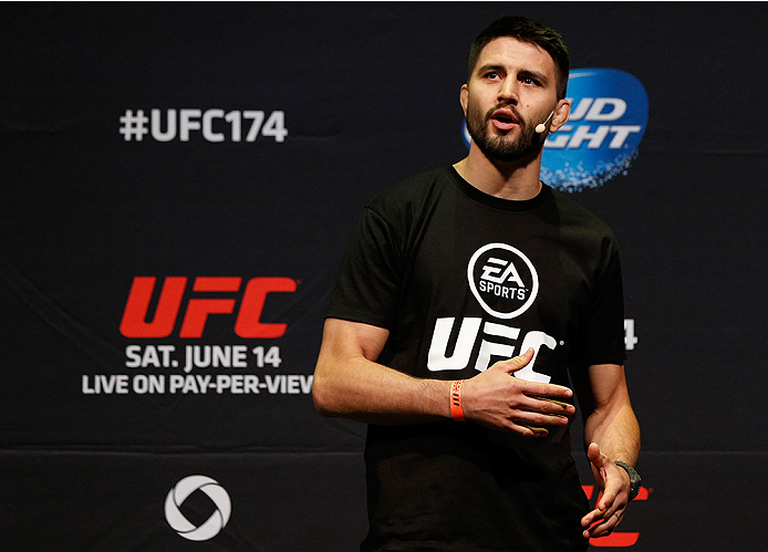 VANCOUVER, BC - JUNE 13:  Carlos Condit interacts with fans during a Q&A session before the UFC 174 weigh-in at Rogers Arena on June 13, 2014 in Vancouver, Canada.  (Photo by Josh Hedges/Zuffa LLC/Zuffa LLC via Getty Images)