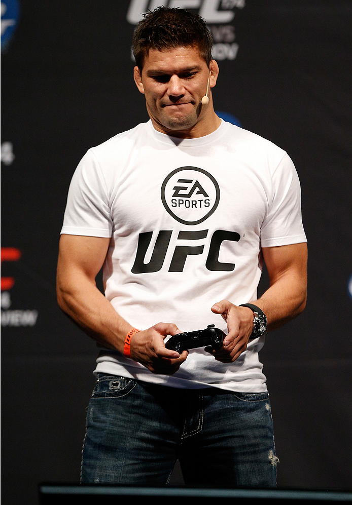 VANCOUVER, BC - JUNE 13:  Josh Thomson battles against Carlos Condit (not pictured) in a demo of the new EA Sports UFC videogame before the UFC 174 weigh-in at Rogers Arena on June 13, 2014 in Vancouver, Canada.  (Photo by Josh Hedges/Zuffa LLC/Zuffa LLC 