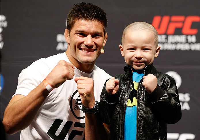 VANCOUVER, BC - JUNE 13: Josh Thomson poses for photos with young fans after a Q&A session before the UFC 174 weigh-in at Rogers Arena on June 13, 2014 in Vancouver, Canada. (Photo by Josh Hedges/Zuffa LLC/Zuffa LLC via Getty Images)