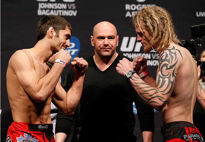 VANCOUVER, BC - JUNE 13:  (L-R) Opponents Jason Saggo and Josh Shockley face off during the UFC 174 weigh-in at Rogers Arena on June 13, 2014 in Vancouver, Canada.  (Photo by Josh Hedges/Zuffa LLC/Zuffa LLC via Getty Images)